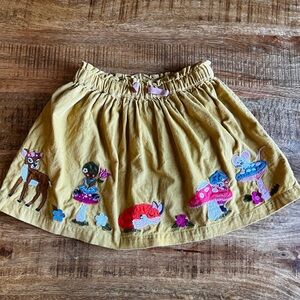 Mini Boden Cord skirt with forest appliqués